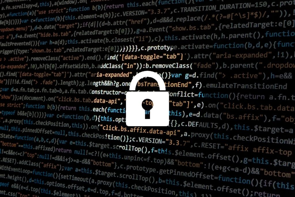 Padlock in front of code.